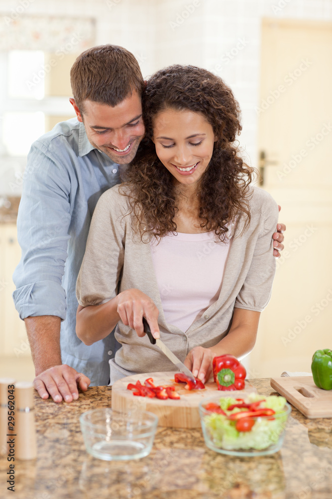 Handsome man cooking with his girlfriend