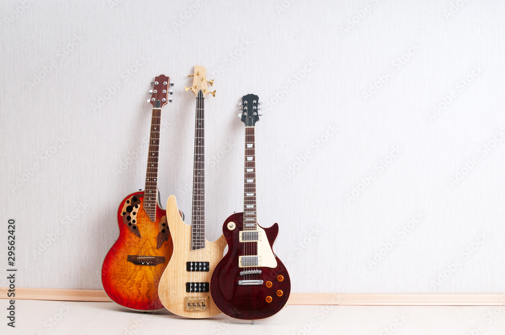 Fototapeta premium Musical concept with wooden guitar