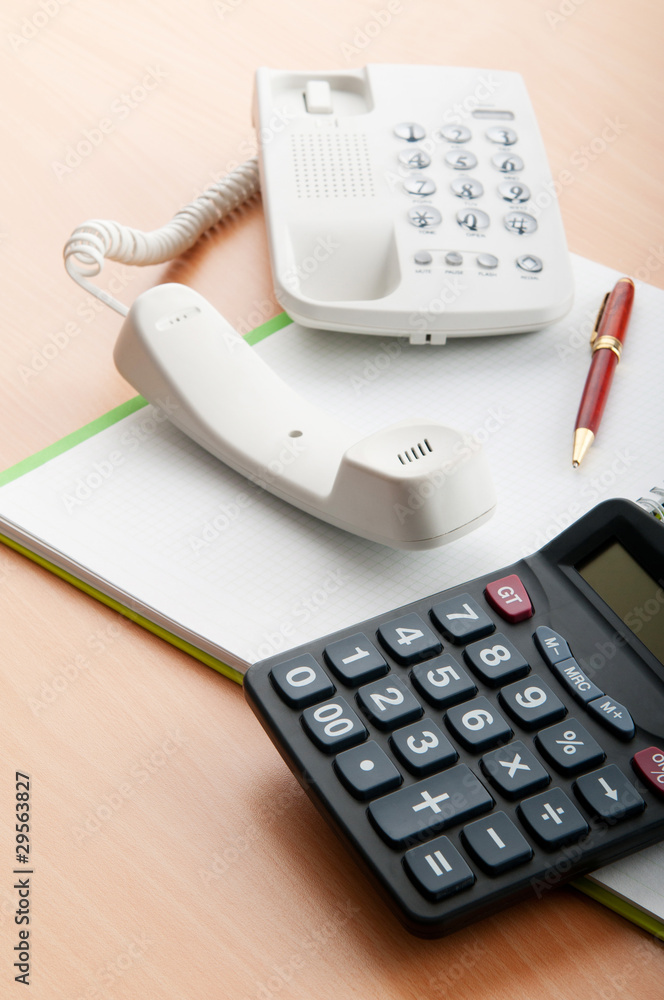 Business concept with notepad and calculator Business concept with notepad and calculator