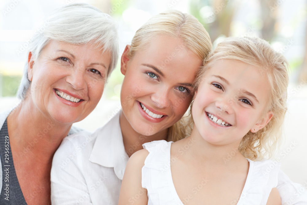 Portrait of a joyful family looking at the camera Portrait of a joyful family looking at the camera