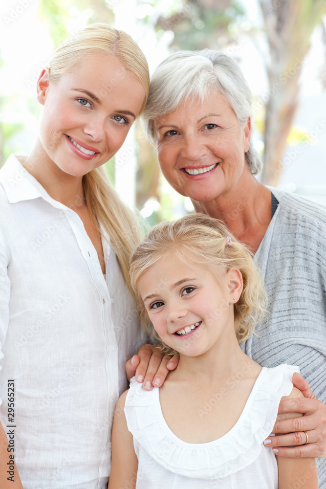 Portrait of a joyful family looking at the camera Portrait of a joyful family looking at the camera