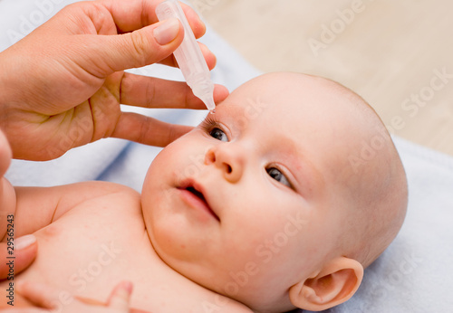 baby taking medicine