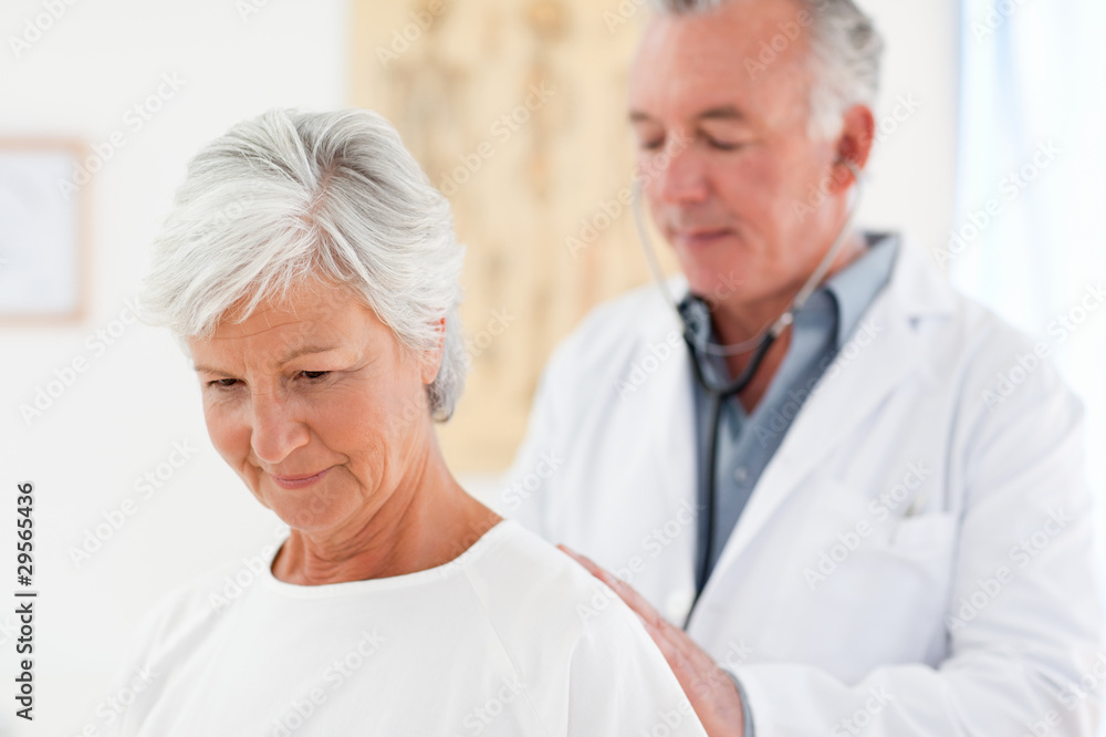 Doctor examining his patient