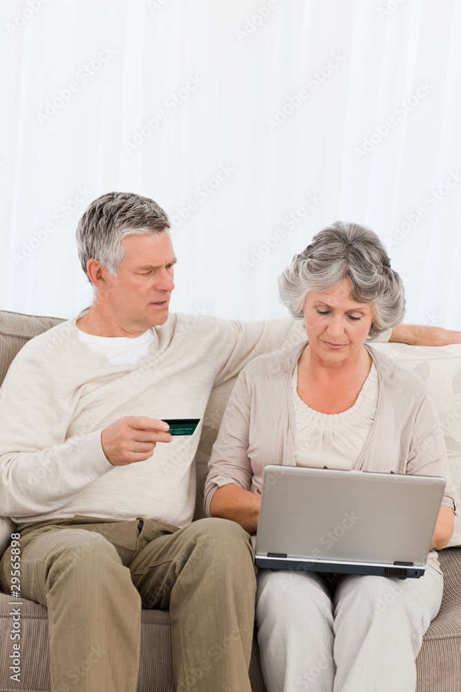 Seniors buying something on internet Seniors buying something on internet