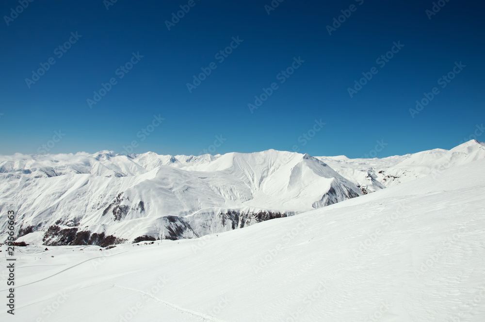 High mountains under snow in the winter High mountains under snow in the winter