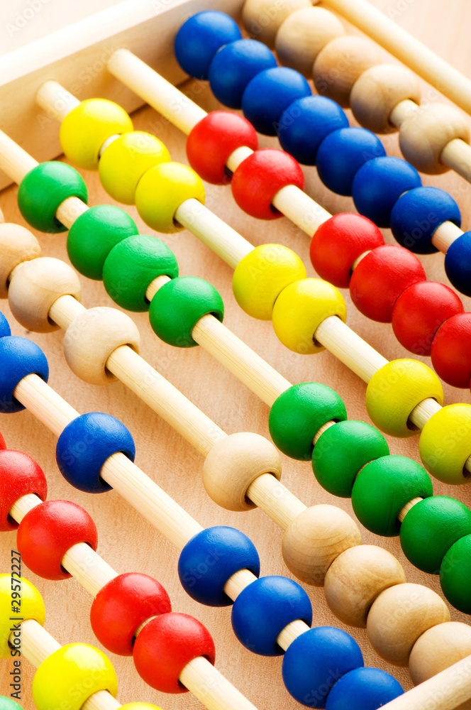 Education concept - Abacus with many colorful beads Education concept - Abacus with many colorful beads