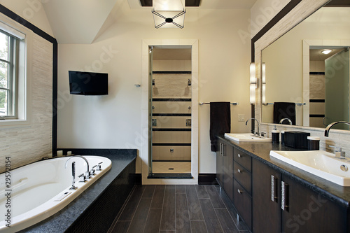 Master bath with dark wood cabinetry © pics721