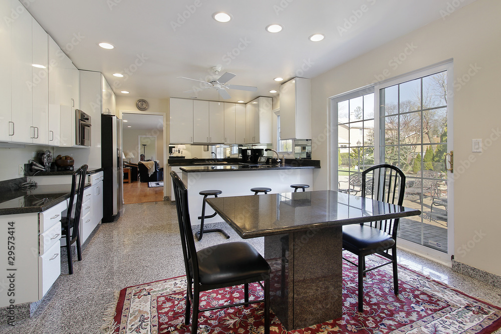 Fototapeta premium Kitchen with white cabinetry