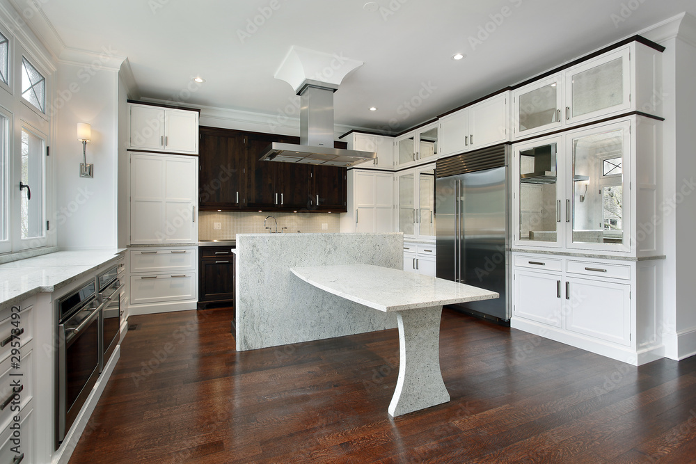 Naklejka premium Modern kitchen with white cabinetry