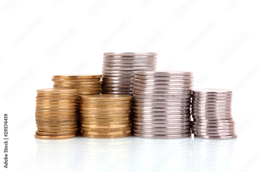 Many coins in column isolated on white Many coins in column isolated on white