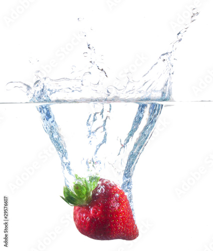 Strawberries Dropping Into Water