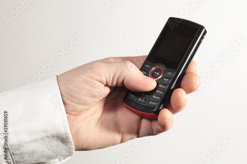 Mobiltelefon in der Hand