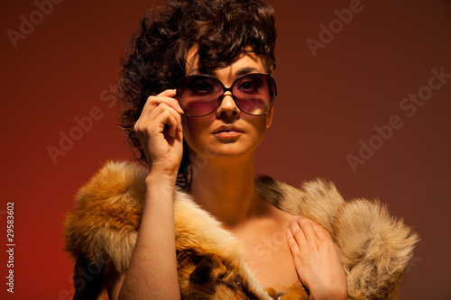 woman wearing fur and glasses photo