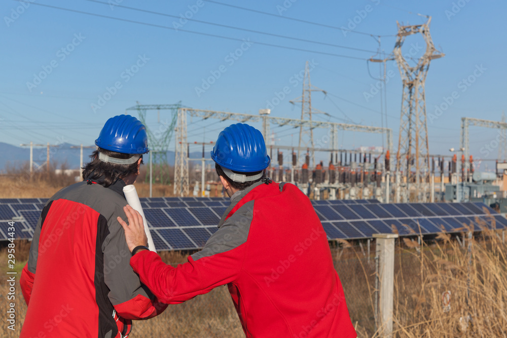 Engineers at Work In a Solar Power Station Engineers at Work In a Solar Power Station