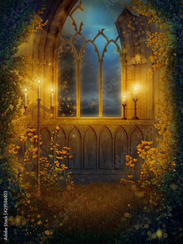 Okno w ruinach zamku ze świecami