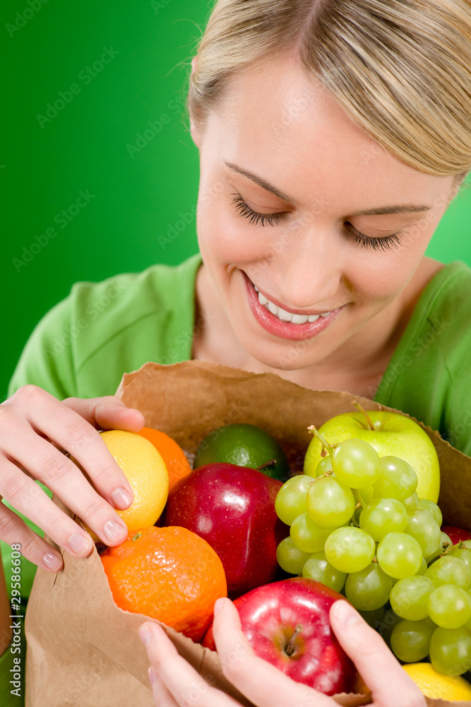 Healthy lifestyle - woman with fruit shopping paper bag Healthy lifestyle - woman with fruit shopping paper bag