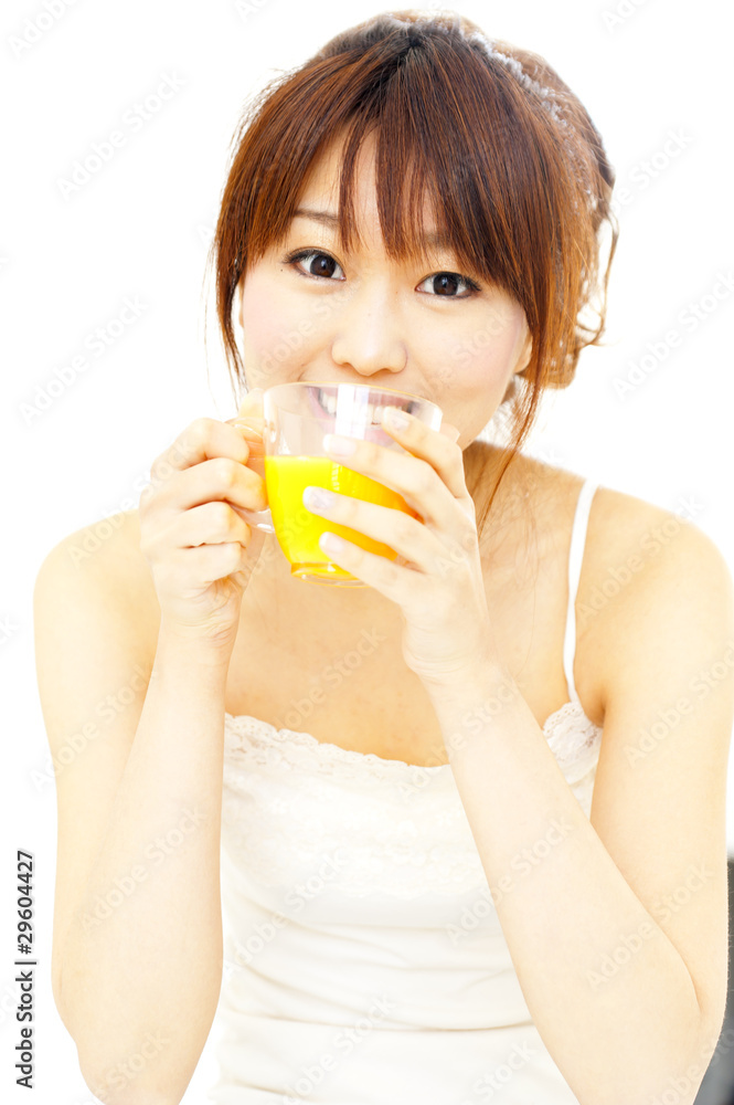 a portrait of beautiful asian woman taking a orange juice a portrait of beautiful asian woman taking a orange juice