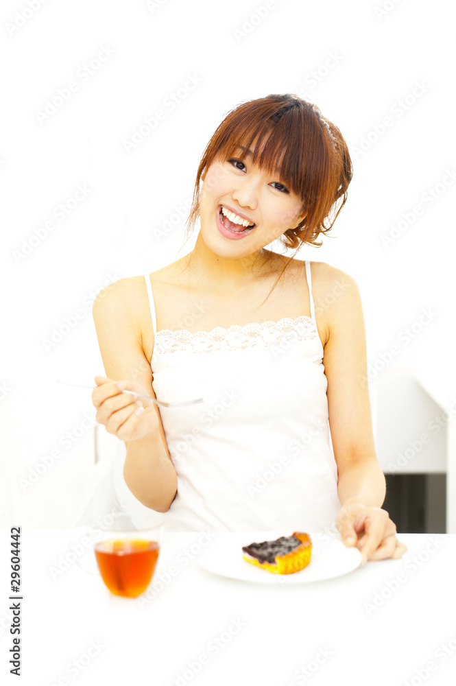 a portrait of beautiful asian woman eating a breakfast