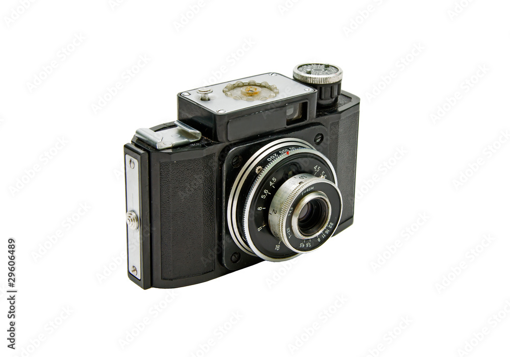 старый фотоаппарат на белом фоне