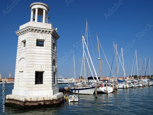 Lighthouse and yachts