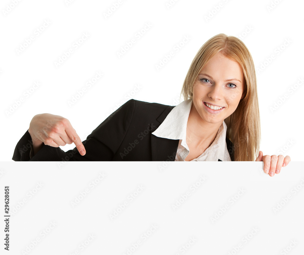Cheerful businesswomen presenting empty board Cheerful businesswomen presenting empty board