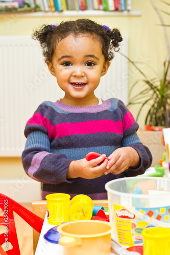girl with play dough