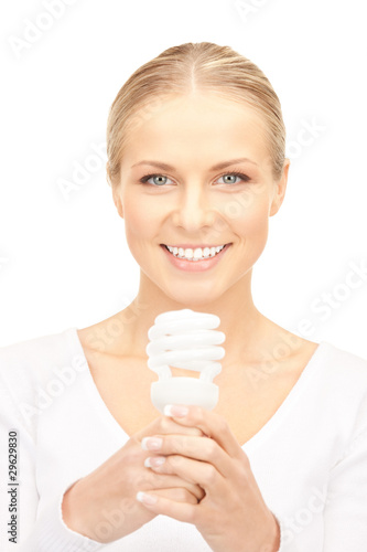 woman holding energy saving bulb