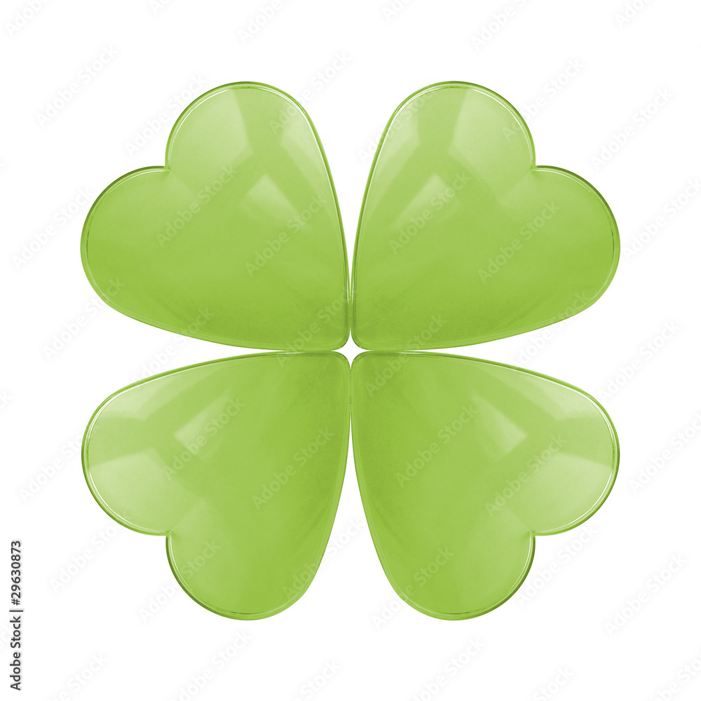 An isolated reflective glass four leaf clover An isolated reflective glass four leaf clover