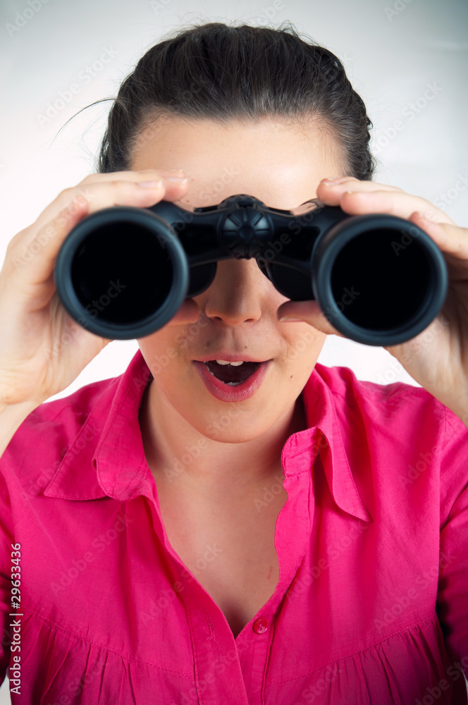 young woman with binoculars young woman with binoculars