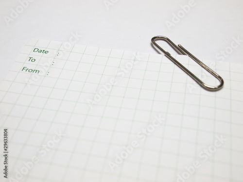 white paper note with table