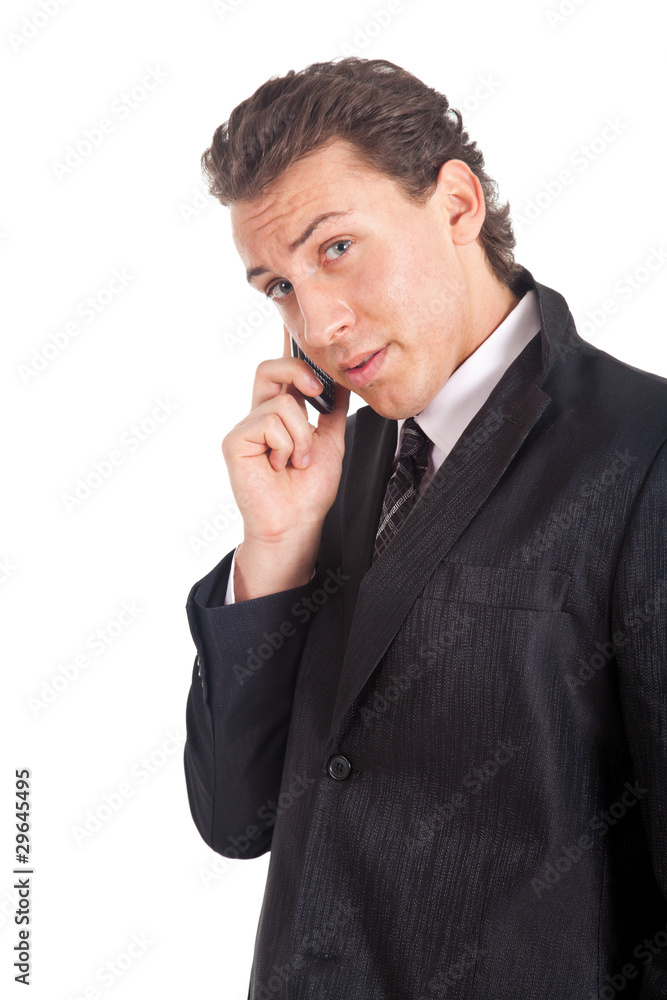 Businessman talking on the phone isolated on white Businessman talking on the phone isolated on white