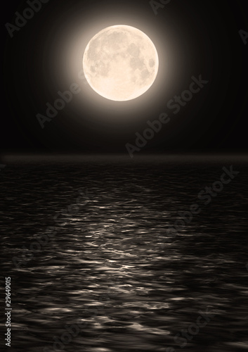 The full moon in the night sky over water © Zhanna Ocheret