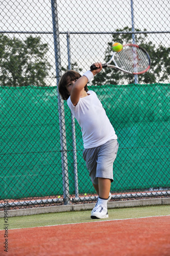 Young boy play tennis © cirkoglu