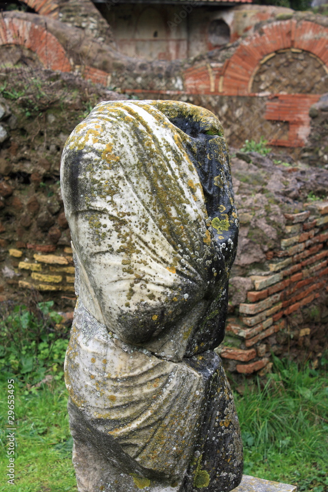 torso of ancient statue in Ostia Antica torso of ancient statue in Ostia Antica