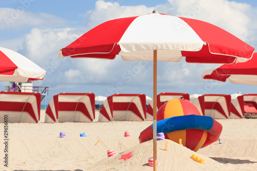 Colorful umbrellas and cabanas in popular South Beach in Miami