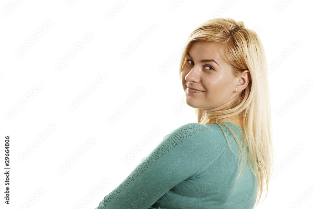 Young woman with long blond hair turned away. Young woman with long blond hair turned away.