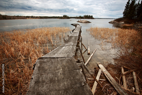 Dilapidated dock on Reed Lake in Northern Manitoba photo