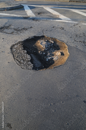 pothole in a road