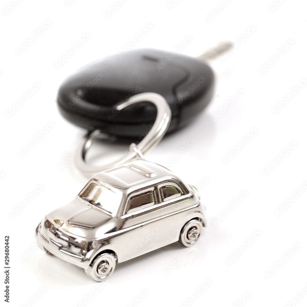 Porte clé en forme de voiture accroché à des clés de voiture Stock Photo |  Adobe Stock