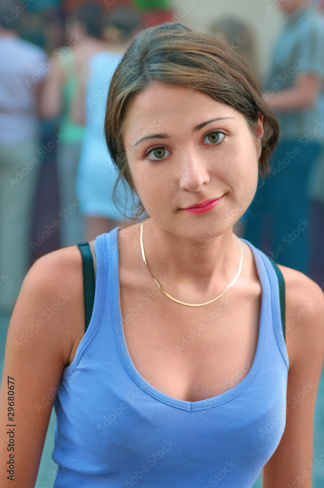 Portrait of the girl in a blue vest