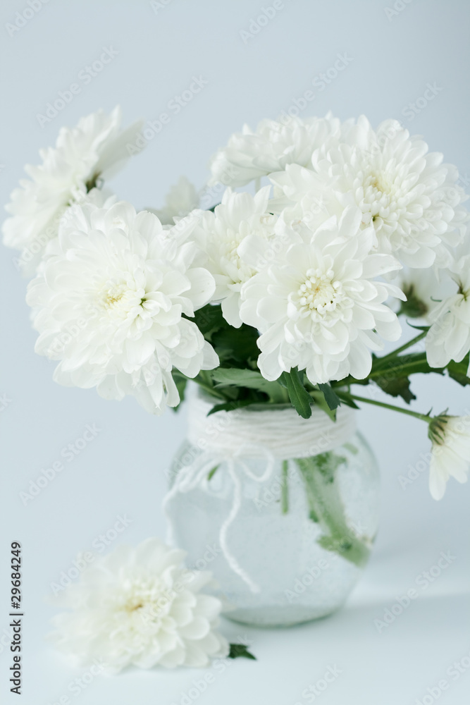 Bouquet of white flowers in a glass vase Bouquet of white flowers in a glass vase