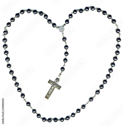 Heart shaped christian rosary isolated on white