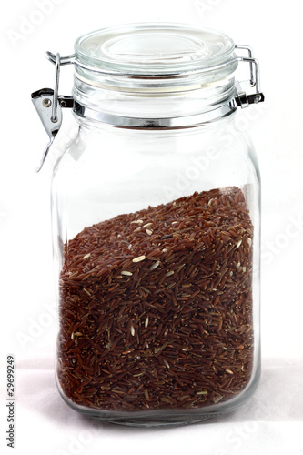 Brown Rice grains in the bottle