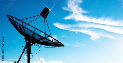satellite dish antennas under sky