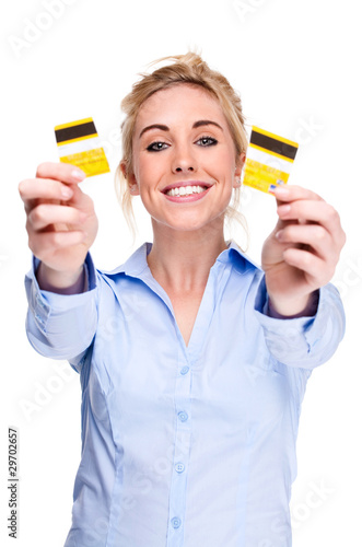 Debt Free - Attractive woman holding cut-up credit card