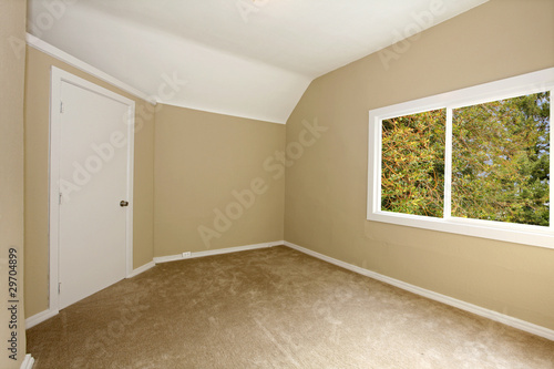 New beige bedroom with carpet