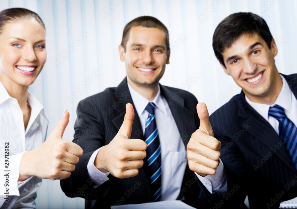 Happy successful gesturing businesspeople. Focus on hands. Happy successful gesturing businesspeople. Focus on hands.