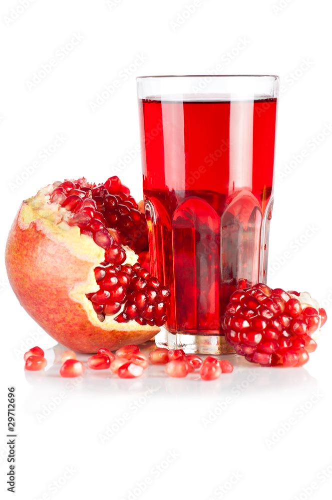 Fresh ripe pomegranate and glass of juice on white background Fresh ripe pomegranate and glass of juice on white background