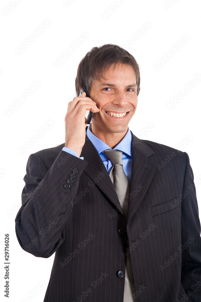 Mature businessman talking on the phone isolated on white Mature businessman talking on the phone isolated on white