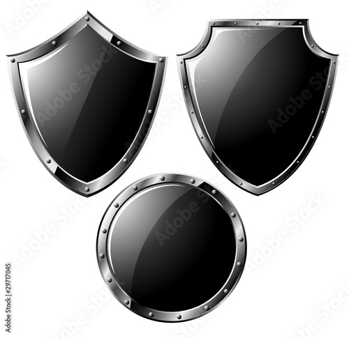 Set of black steel shields - isolated on white